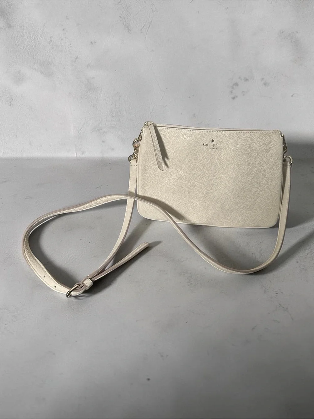 kate spade Pebbled Leather Crossbody Bag in Light Beige